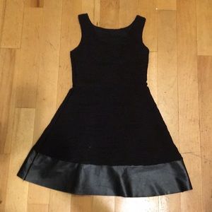 Black fit and flare dress with faux leather trim
